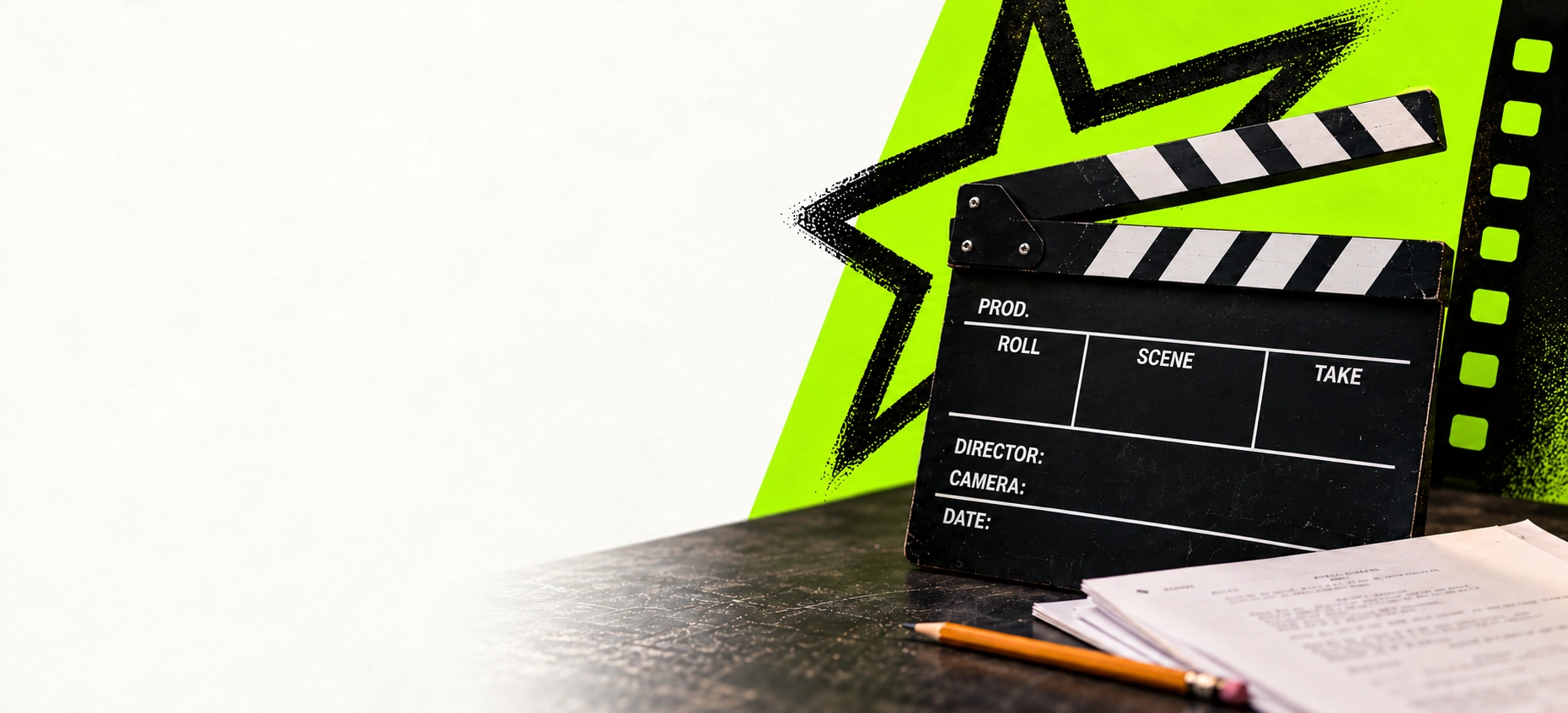 Landscape film clapperboard, lime star and scripts with an ivory area for the homepage headline